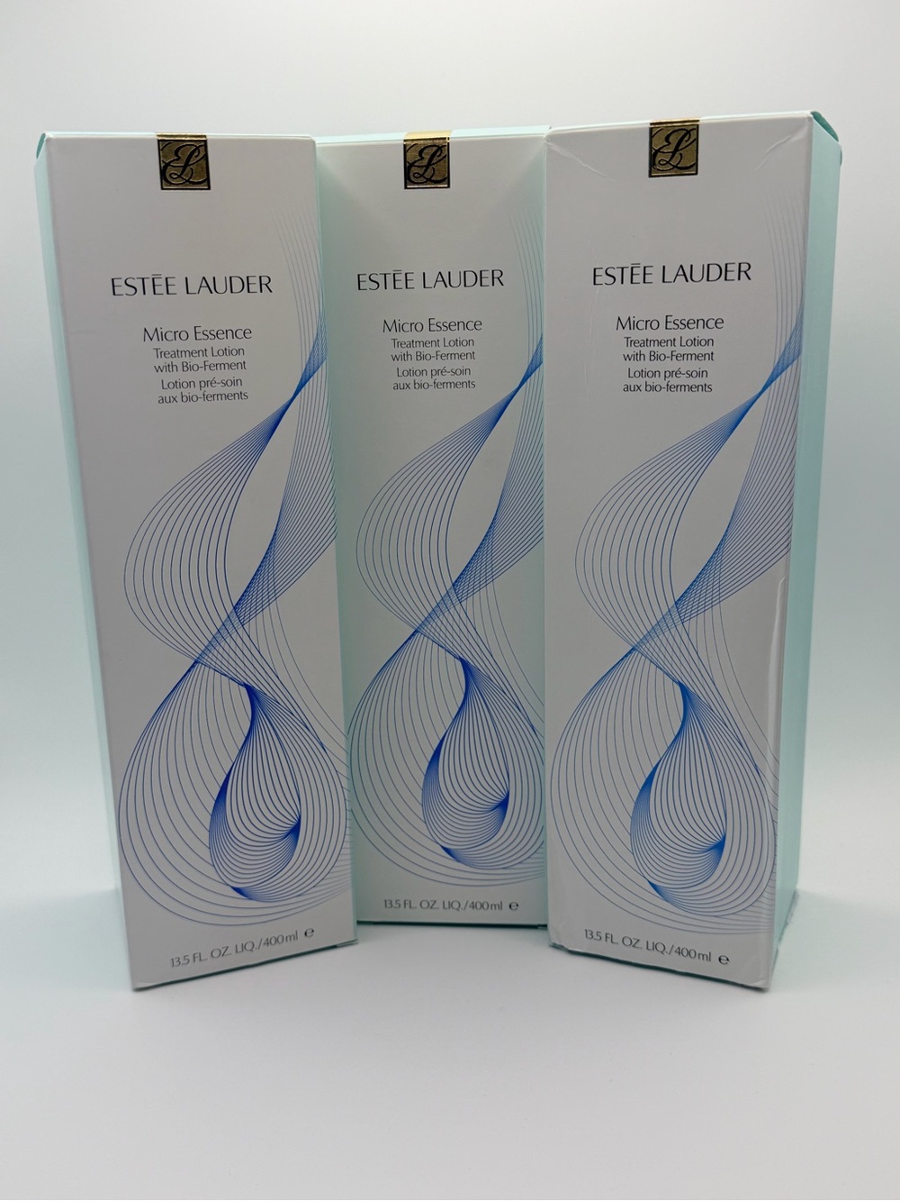 Estée Lauder Micro Essence Treatment Lotion NEW 13.5oz Lot of 3 - Picture 1 of 7